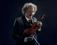 Geoffrey-Rush-as-Einstein-with-violin-LOWRES-640x505